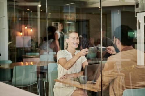 Advisors in a warm consultation meeting with a client